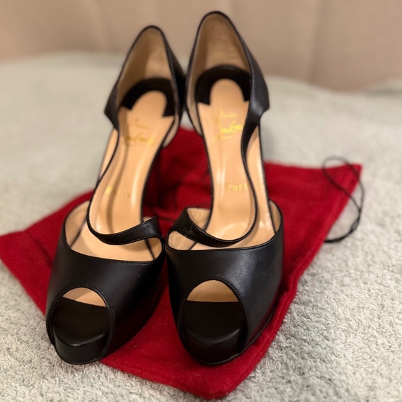 Christian Louboutin - Picture 1 of 7